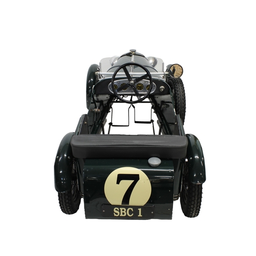 626 - A Bentley 1930s Le Mans style pedal car Green coachwork, number (7), Bentley badge, rubber tyres, l... 