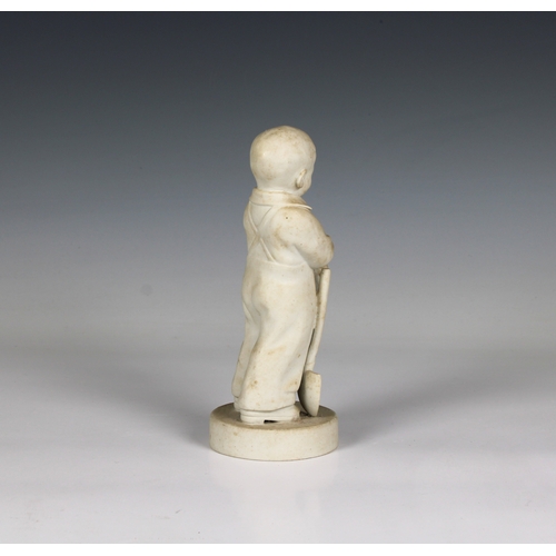 75 - A Parian Ware figure of a young boy putting on a mitten and resting against a spade impressed mark 