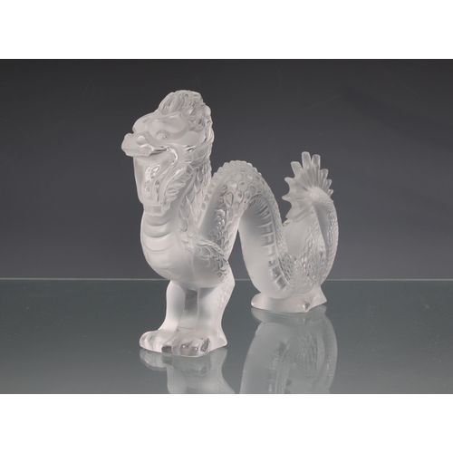 8 - A Lalique clear & frosted glass Dragon no 1213300, 2000, 11¼in. (28.7cm.) long, original sticker, et... 