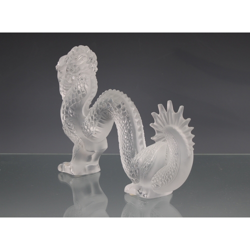 8 - A Lalique clear & frosted glass Dragon no 1213300, 2000, 11¼in. (28.7cm.) long, original sticker, et... 