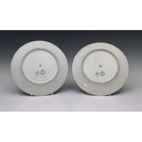 83 - A pair of mid 19th century Sevres Chateau de Dreux porcelain cabinet plates with a bleu celeste grou... 