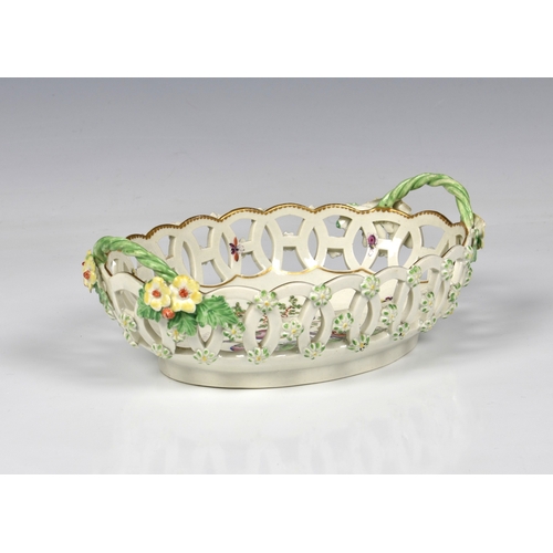 86 - A Worcester First Period porcelain pierced oval basket c.1770, painted with exotic birds in a landsc... 