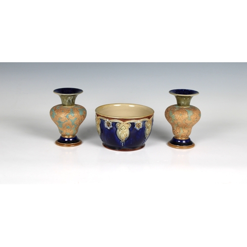 90 - A pair of miniature Doulton Lambeth vases of squat baluster form, decorated with stylised floral gil... 