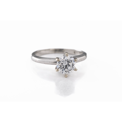 673 - A platinum and diamond solitaire ring, the round brilliant-cut diamond approx 1 carat (6.38 x 6.39mm... 