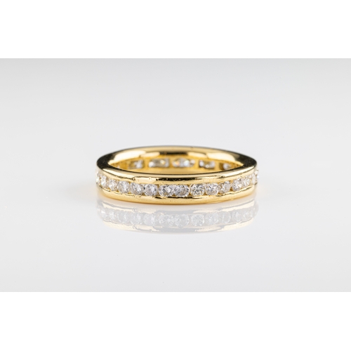 685 - A diamond full eternity ring The 18ct yellow gold full eternity ring channel-set with brilliant-cut ... 