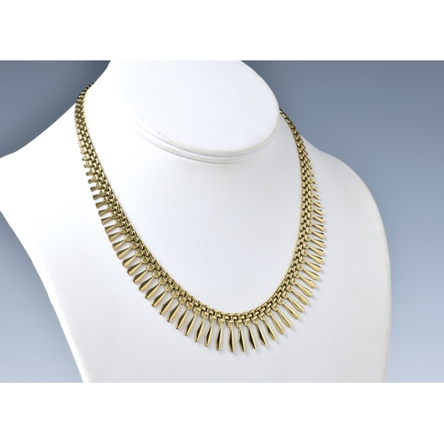 786 - A 9ct gold fringe necklace hallmarked with import marks for Birm. 1986, 16in. (40.7cm.) long.