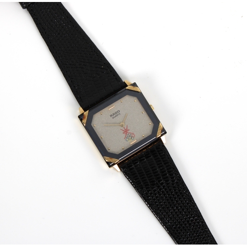 851 - A Rado Florence gold plated and black ceramic watch bearing the logo of the Omani Olympic team on th... 