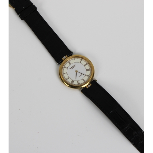 852 - A Raymond Weil Geneve gold plated quartz watch black leather strap, with guarantee in original box. ... 