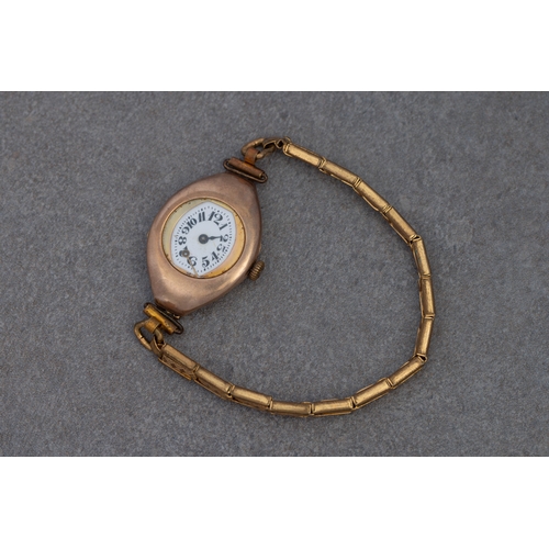 853 - An antique 9ct rose gold cased ladies wrist watch hallmarked London 1915, the manual wind movement f... 