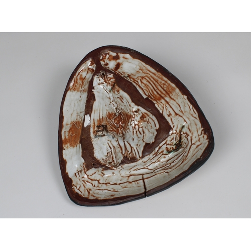 15 - Guernsey Studio pottery - Elizabeth Ann Macphail (1939-89) A flat back stylised cellist or double ba... 