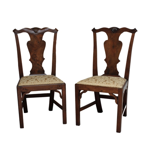 182 - Pair of George II walnut side chairs the yoked top rail with shell carving above the solid vase spla... 