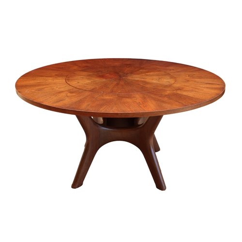 198 - A modern circular oak dining table with revolving lazy Susan to centre, on organic style supports, 6... 