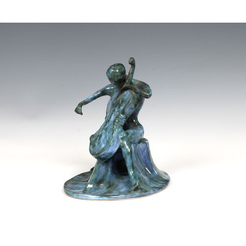 2 - Guernsey Studio pottery - Elizabeth Ann Macphail (1939-89) A turquoise glazed stylised cellist or do... 