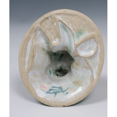 20 - Guernsey Studio pottery - Elizabeth Ann Macphail (1939-89) A green glazed stylised cellist or double... 