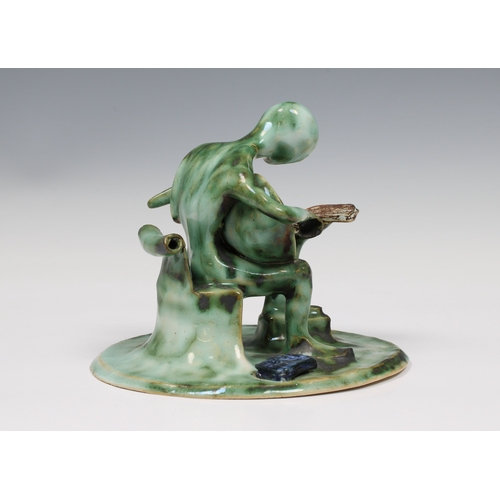 22 - Guernsey Studio pottery - Elizabeth Ann Macphail (1939-89) A stylised green glaze lute player sculpt... 