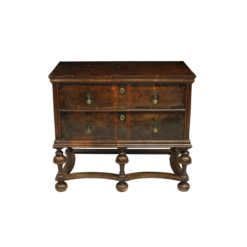 224 - A William and Mary walnut chest the crossbanded and chevron inlaid top over two graduated drawers wi... 