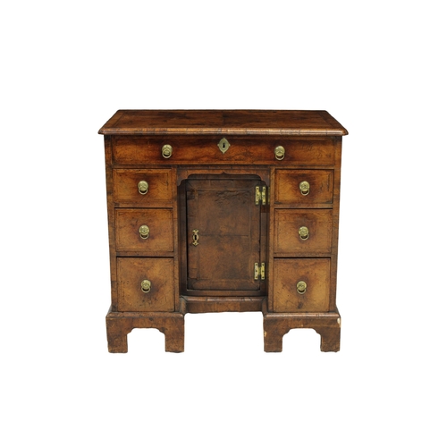 239 - A Fine George II walnut kneehole desk the moulded top with quarter veneer and herringbone banding ov... 