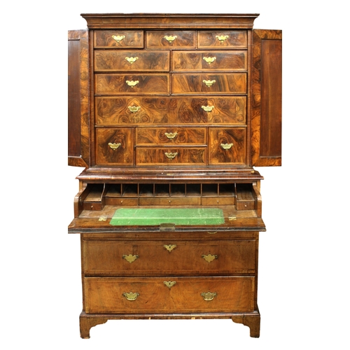 240 - A fine George I walnut secretaire cabinet on chest, upper section with laburnum interior the flared ... 