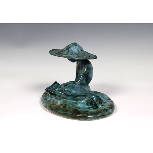 26 - Guernsey Studio pottery - Elizabeth Ann Macphail (1939-89) A turquoise glazed stylised figure relaxi... 