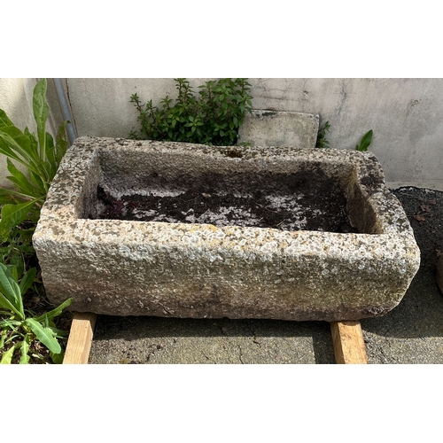 280 - A rectangular granite trough 39¼ x 20½in. (99.7 x 52cm.), 10½in. (26.6cm.) deep.