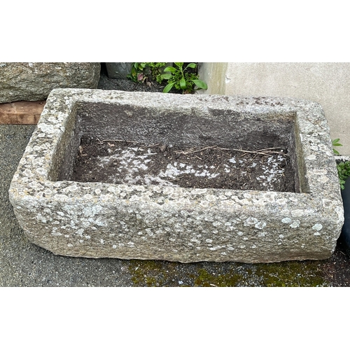 285 - A rectangular granite trough 35 x 21½in. (88.9 x 54.7cm.), 11in. (28cm.) deep.