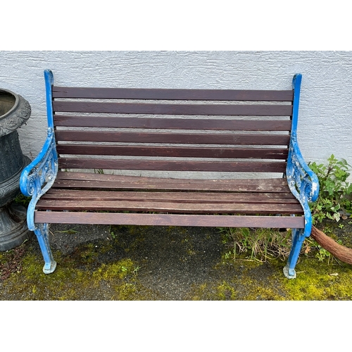 289 - A cast metal and wood slatted garden bench painted blue, 49 3/8 x 22in. (125.5 x 55.8cm.), 34in. (86... 