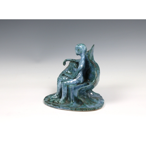 5 - Guernsey Studio pottery - Elizabeth Ann Macphail (1939-89) A turquoise glazed stylised seated figure... 