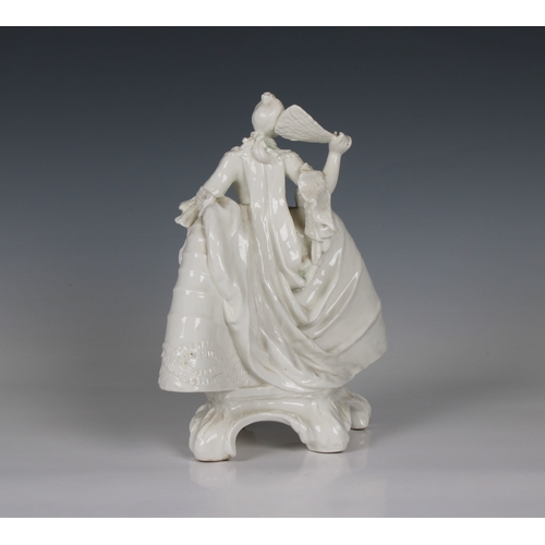 77 - A Nymphenburg white porcelain figure of a lady with a fan circa 1920, perhaps from a model by J.P.R.... 