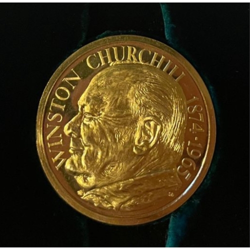 232 - A Winston Churchill 22ct gold medallion By Medallioners, 45mm.