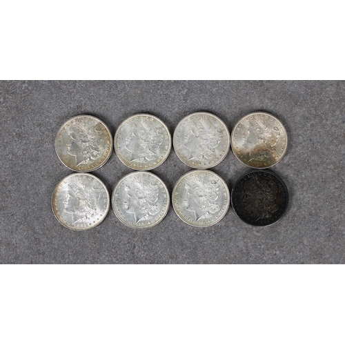 91 - A collection of eight (8) Morgan Dollars to include two 1883; 1884; five 1904. (8)