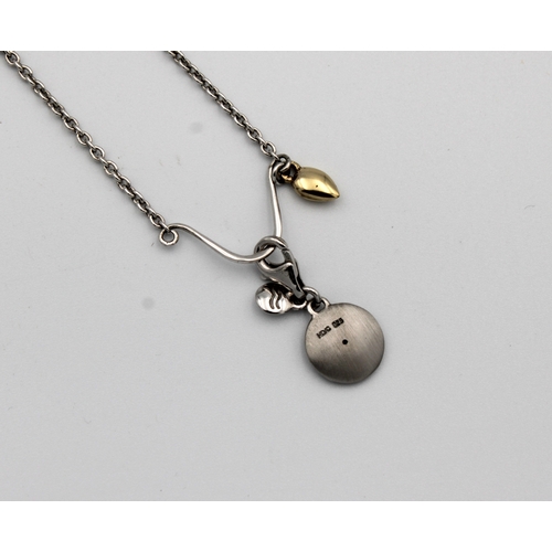 1057 - A Ray & Scott Aquarius zodiac charm necklace in silver with yellow metal diamond / white stone teard... 