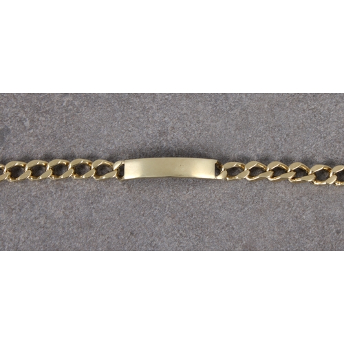 1061 - A 9ct yellow gold curb link identity bracelet 18.8cm. long.