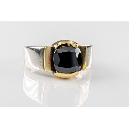 1167 - A Bruce Russell of Guernsey 18ct yellow gold, silver and black stone ring approximate size K.