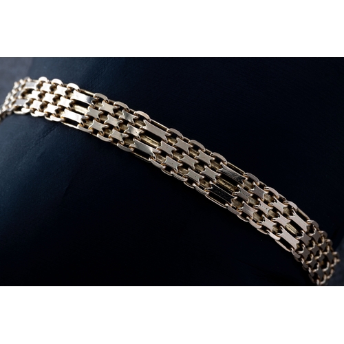 1218 - A 9ct yellow gold gate bracelet length 20.5cm.