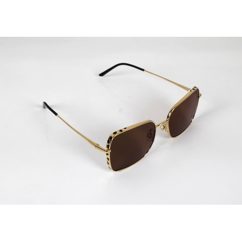 1305 - A boxed pair of Cartier gold plated Aviator sun glasses with booklet, leaflet, box, outer box and or... 