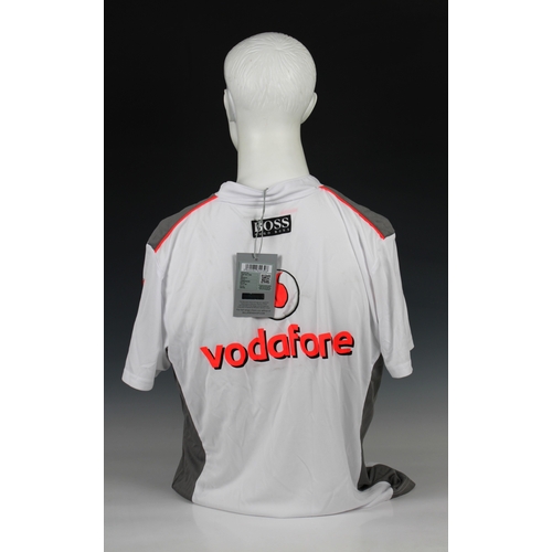 1307 - A Vodafone McLaren Mercedes F1 team X- Large size Hugo Boss male T-Shirt - Signed in black marker to... 