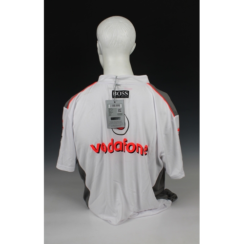 1308 - A Vodafone McLaren Mercedes F1 team X- Large size male Hugo Boss T-Shirt - Signed in black marker to... 