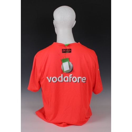 1312 - A Vodafone McLaren Mercedes official F1 team bright orange Hugo Boss large T-Shirt, signed below nec... 