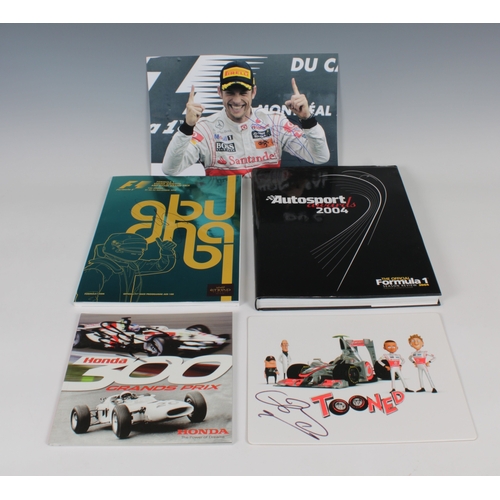 1321 - A collection of Jenson Button F1 memorabilia to include a Diecast race models boxed 2009 Brawn Merce... 