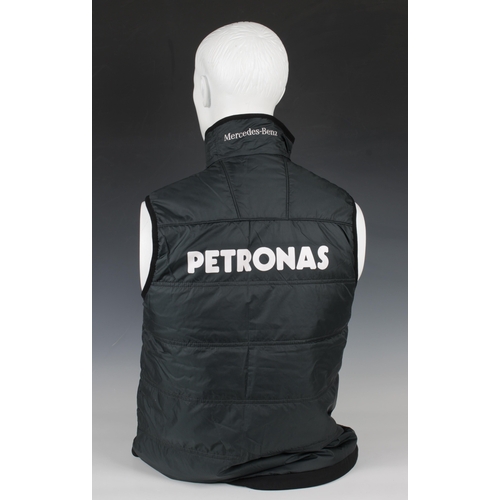 1328 - Grand Prix F1 interest - A Henri Lloyd woman's Mercedes-Benz Petronas / Bridgestone body warmer gile... 