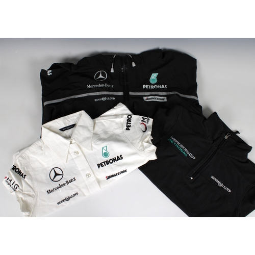 1328 - Grand Prix F1 interest - A Henri Lloyd woman's Mercedes-Benz Petronas / Bridgestone body warmer gile... 