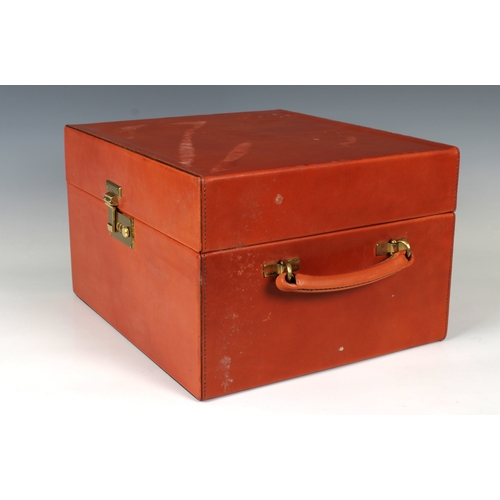 1345 - A Bentley orange leather travel case containing two champagne buckets and two Stuart crystal glasses... 