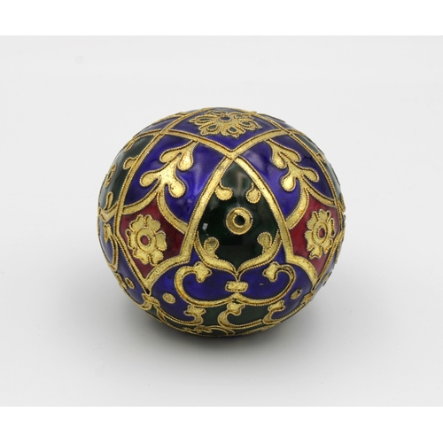 1366 - A vintage enamelled paperweight having criss-cross, foliate, floral and swag decoration, highlighted... 