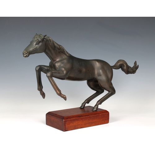 1383 - Somchai Hattakitkosol (Thai, 1934-2000) Galloping Horse, bronze, on a wooden base, impressed on leg ... 