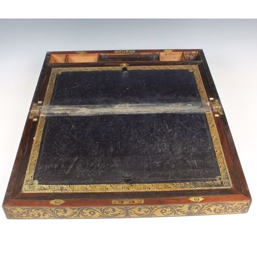 1390 - A 19th century Victorian brass foliate banded rosewood writing slope the interior having black toole... 