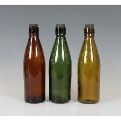 1393 - A set of three Jersey Ann St Brewery Co Ltd beer bottles in three different colours, red/green/amber... 