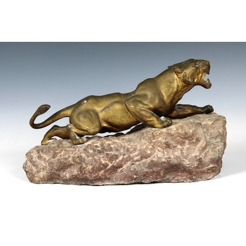 1399 - After Charles Valton (1851-1918) - Tiger bronze modelled crouching and pierced by arrows, raised on ... 