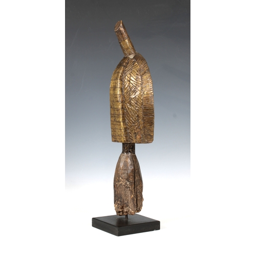 1401 - Ethnographica - A Kota Reliquary Figure Gabon, early 20th Century, applied and hammered metalwork on... 