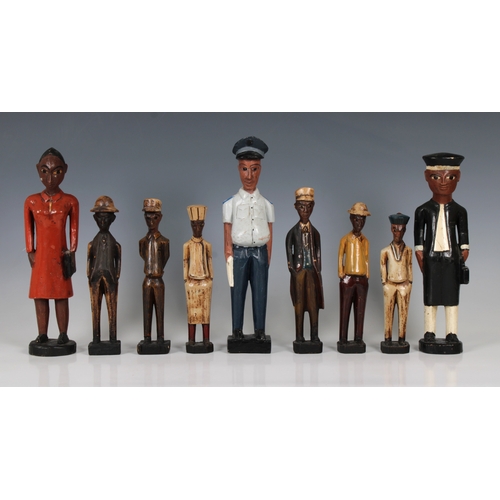 1411 - Ethnographica - A group of Colon statues Likely Ivory Coast, 20th Century, to include a judge, polic... 