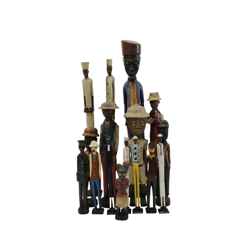 1412 - Ethnographica - A group of Colon figures Likely Ivory Coast, 20th Century, to include a baker, a jud... 